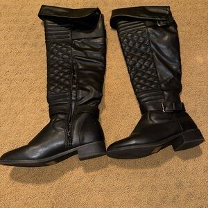 Women’s size 7.5 high boots.